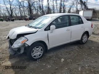 2010 Nissan Versa 1.8 S with VIN 3N1BC1AP5AL433273, listed as a Copart auction lot 49530095 with 128,769 mi miles and Salvage Title. Bid and sale history available at carsss.com. Image 1.