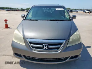 2007 Honda Odyssey EX with VIN 5FNRL38437B068697, listed as a Copart auction lot 60875505 with 211,688 mi miles and Salvage title. Bid and sale history available at DreamBid. Image 5.