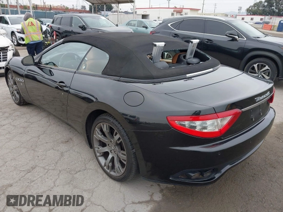2014 Maserati GranTurismo Sport with VIN ZAM45MMA4E0078412, listed as a IAAI auction lot 42239631 with 31,392 mi miles and . Bid and sale history available at DreamBid. Image 3.