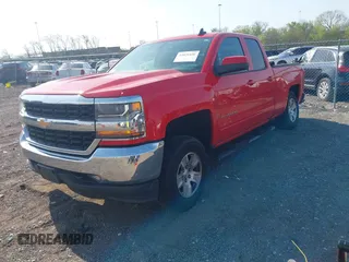 2018 Chevrolet Silverado 1500 LT with VIN 1GCVKREH2JZ264045, listed as a IAAI auction lot 42020426 with 135,719 mi miles and . Bid and sale history available at DreamBid. Image 2.