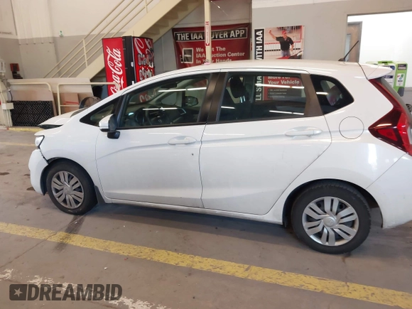 2015 Honda Fit LX with VIN 3HGGK5H57FM106670, listed as a IAAI auction lot 42097655 with 116,303 mi miles and . Bid and sale history available at DreamBid. Image 14.