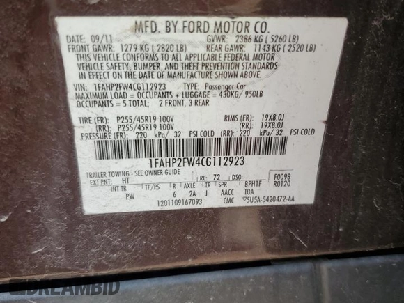 2012 Ford Taurus Limited z VIN 1FAHP2FW4CG112923, wystawiony jako Copart lot #56169085 z przebiegiem 142 687 mil mil oraz Szkoda całkowita • Salvage title. Historia ofert i sprzedaży dostępna na DreamBid. Obrazek 12.