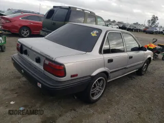1992 Toyota Corolla z VIN 1NXAE91A1NZ346555, wystawiony jako Copart lot #37697334 z przebiegiem 232 988 mil mil oraz Szkoda całkowita • Salvage title. Historia ofert i sprzedaży dostępna na DreamBid. Obrazek 3.