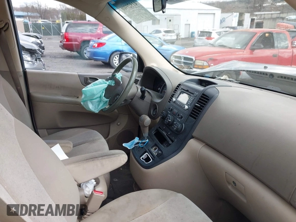 2009 Kia Sedona LX with VIN KNDMB233696299758, listed as a IAAI auction lot 41929906 with 214,445 mi miles. Bid and sale history available at carsss.com. Image 5.