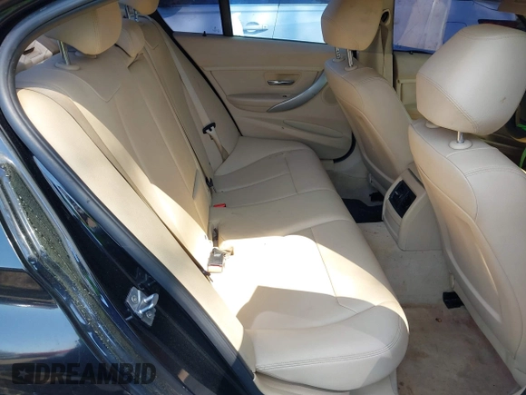 2014 BMW 3 Series 320i with VIN WBA3B1C56EK131849, listed as a IAAI auction lot 42018005 with 215,765 mi miles. Bid and sale history available at carsss.com. Image 8.