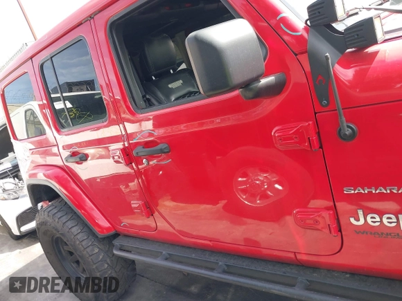 2019 Jeep Wrangler Unlimited Sahara with VIN 1C4HJXEN0KW552028, listed as a IAAI auction lot 41934634 with 53,054 mi miles and . Bid and sale history available at DreamBid. Image 14.