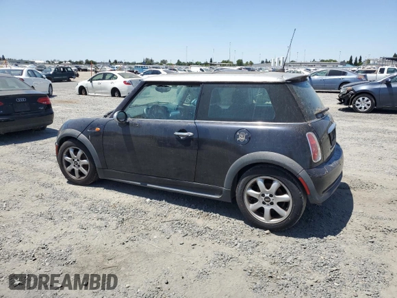 2006 MINI Hardtop with VIN WMWRC33516TK73752, listed as a Copart auction lot 62053245 with 126,836 mi miles and Clean title. Bid and sale history available at DreamBid. Image 2.