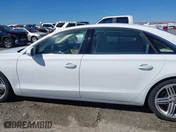 2013 Audi A8 L 3.0L with VIN WAURGAFD8DN033742, listed as a IAAI auction lot 41775363 with 101,610 mi miles. Bid and sale history available at carsss.com. Image 14.