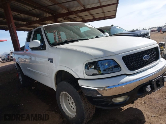 1999 Ford F-150 XL with VIN 2FTRX18L9XCA21004, listed as a IAAI auction lot 41616300 with 186,620 mi miles. Bid and sale history available at carsss.com. Image 1.
