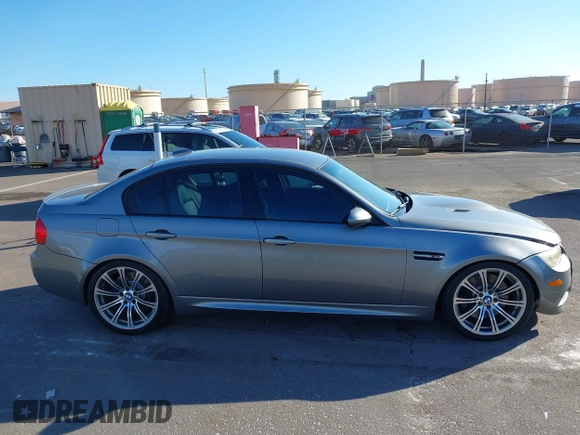 2010 BMW M3 with VIN WBSPM9C50AE202168, listed as a IAAI auction lot 41255651 with 142,845 mi miles. Bid and sale history available at carsss.com. Image 13.