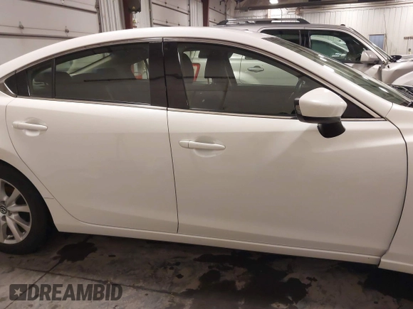 2016 Mazda Mazda6 i Sport with VIN JM1GJ1U54G1473671, listed as a IAAI auction lot 41576038 with 88,386 mi miles. Bid and sale history available at carsss.com. Image 14.