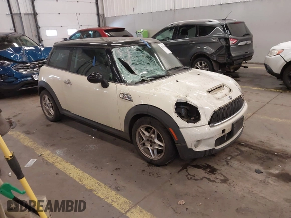 2009 MINI Hardtop S with VIN WMWMF73509TW85898, listed as a IAAI auction lot 41559954 with 97,186 mi miles and . Bid and sale history available at DreamBid. Image 1.