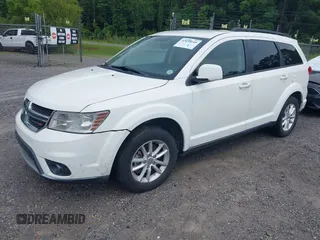 2015 Dodge Journey SXT z VIN 3C4PDCBG3FT561089, wystawiony jako IAAI lot #42634049 z przebiegiem 108 035 mil mil oraz . Historia ofert i sprzedaży dostępna na DreamBid. Obrazek 2.