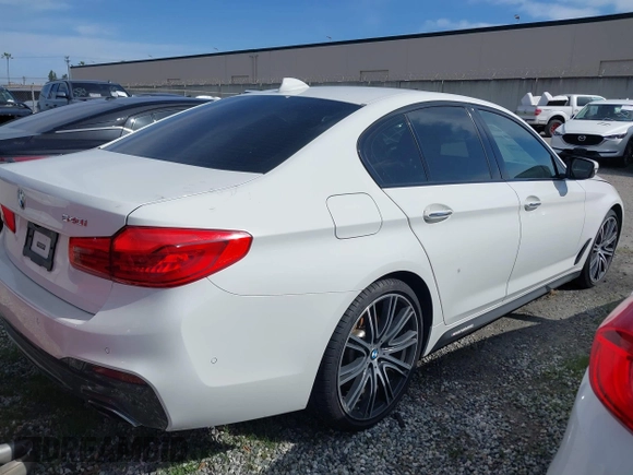 2018 BMW 5 Series 540i with VIN WBAJE5C56JG918691, listed as a IAAI auction lot 41608360 with 46,799 mi miles and . Bid and sale history available at carsss.com. Image 4.