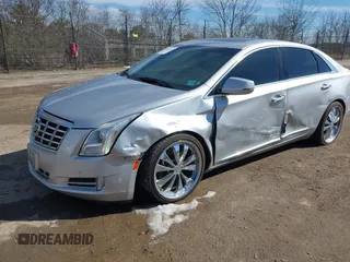2013 Cadillac XTS Luxury with VIN 2G61R5S34D9233991, listed as a IAAI auction lot 41825533 with 152,706 mi miles. Bid and sale history available at carsss.com. Image 2.