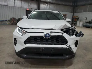 2021 Toyota RAV4 Hybrid XLE with VIN JTMRWRFV3MD127501, listed as a Copart auction lot 84239034 with 75,707 mi miles and Salvage Title. Bid and sale history available at carsss.com. Image 5.