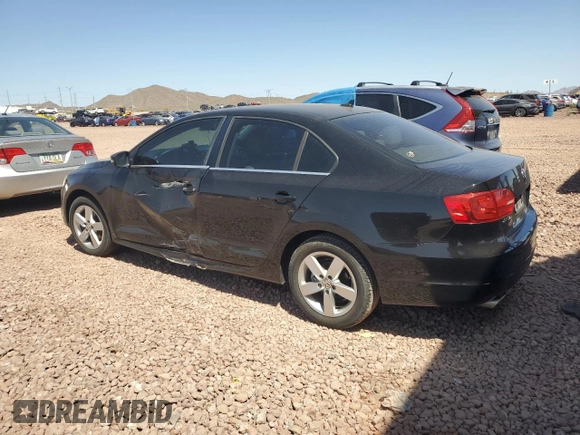 2014 Volkswagen Jetta TDI w/Premium with VIN 3VWLL7AJ8EM402757, listed as a Copart auction lot 52201895 with 99,475 mi miles and Salvage title. Bid and sale history available at DreamBid. Image 2.