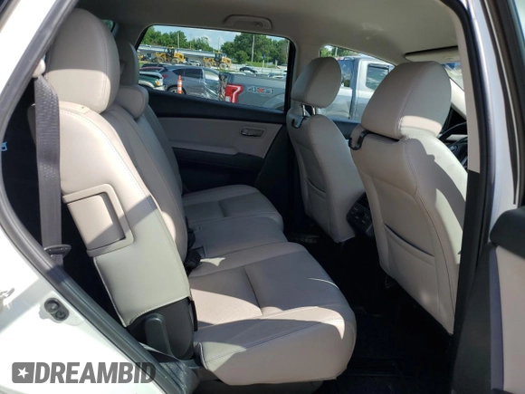 2015 Mazda CX-9 Touring z VIN JM3TB2CA6F0456866, wystawiony jako Copart lot #61475635 z przebiegiem 180 916 mil mil oraz Czysty tytuł • Clean title. Historia ofert i sprzedaży dostępna na DreamBid. Obrazek 10.