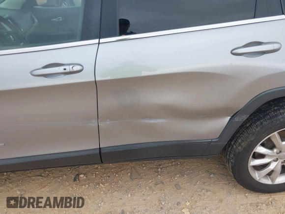 2015 Jeep Cherokee Limited with VIN 1C4PJMDS3FW706058, listed as a IAAI auction lot 41951302 with 163,404 mi miles. Bid and sale history available at carsss.com. Image 6.