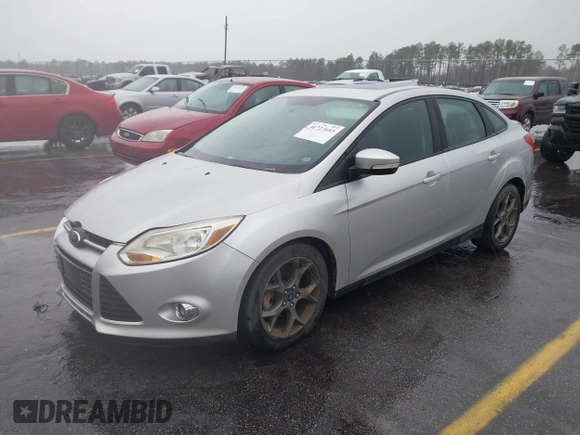 2013 Ford Focus SE with VIN 1FADP3F22DL354250, listed as a IAAI auction lot 41727693 with 171,011 mi miles. Bid and sale history available at carsss.com. Image 2.