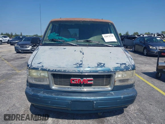 1998 GMC Safari z VIN 1GKDM19W7WB500418, wystawiony jako IAAI lot #42072710 z przebiegiem Nie podano mil oraz . Historia ofert i sprzedaży dostępna na DreamBid. Obrazek 6.