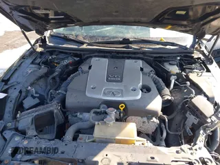 2015 Infiniti Q50 with VIN JN1BV7AR5FM390226, listed as a IAAI auction lot 41588250 with 121,928 mi miles. Bid and sale history available at carsss.com. Image 10.