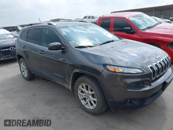 2015 Jeep Cherokee Latitude z VIN 1C4PJMCS2FW601271, wystawiony jako IAAI lot #41969742 z przebiegiem 94 224 mil mil oraz . Historia ofert i sprzedaży dostępna na DreamBid. Obrazek 1.