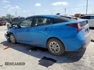 2020 Toyota Prius L Eco z VIN JTDKARFU3L3125646, wystawiony jako Copart lot #52942245 z przebiegiem 104 999 mil mil oraz Szkoda całkowita • Salvage title. Historia ofert i sprzedaży dostępna na DreamBid. Obrazek 2.