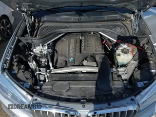 2018 BMW X5 xDrive35i with VIN 5UXKR0C52JL073889, listed as a IAAI auction lot 42035042 with 36,564 mi miles. Bid and sale history available at carsss.com. Image 10.
