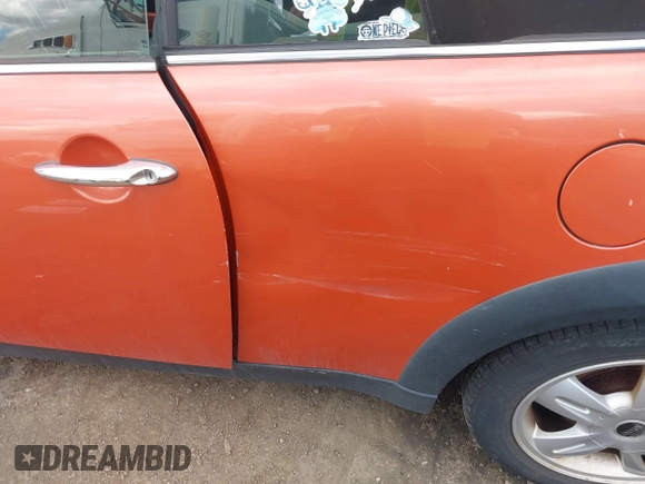 2006 MINI Convertible with VIN WMWRF33546TF65857, listed as a IAAI auction lot 41814032 with 91,736 mi miles and . Bid and sale history available at DreamBid. Image 6.