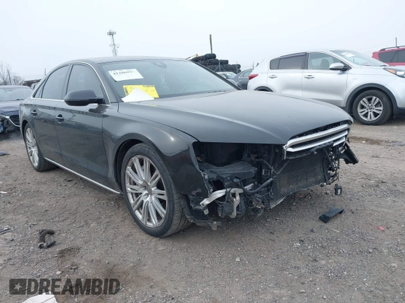 2012 Audi A8 с VIN WAUAVAFD0CN035731, выставлен на аукционе IAAI как лот 41286022 с пробегом 82 835 миль миль и . История ставок и продаж доступна на DreamBid. Изображение 18.