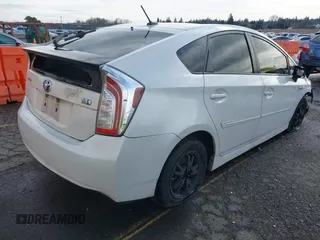 2015 Toyota Prius Four z VIN JTDKN3DU4F1883032, wystawiony jako IAAI lot #41528573 z przebiegiem 104 056 mil mil oraz . Historia ofert i sprzedaży dostępna na DreamBid. Obrazek 4.