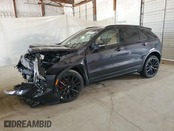 2023 Cadillac XT4 AWD Sport z VIN 1GYFZFR41PF103650, wystawiony jako Copart lot #59321355 z przebiegiem 27 092 mil mil oraz Szkoda całkowita • Salvage title. Historia ofert i sprzedaży dostępna na DreamBid. Obrazek 1.