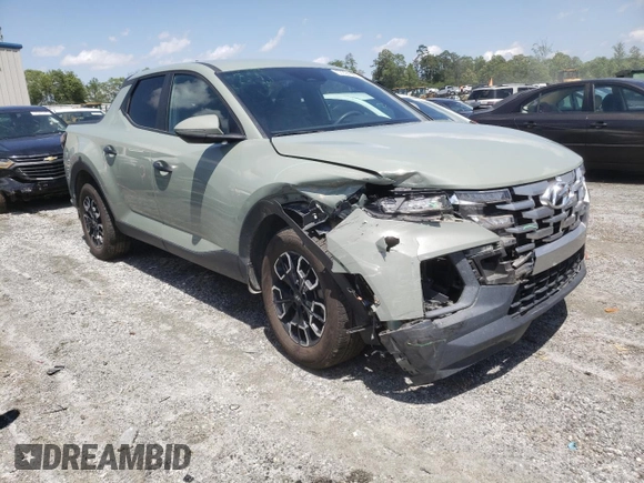 2023 Hyundai Santa Cruz SEL with VIN 5NTJBDAE9PH054993, listed as a Copart auction lot 57294935 with 46,527 mi miles and Salvage title. Bid and sale history available at DreamBid. Image 4.