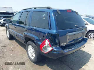 2002 Jeep Grand Cherokee Laredo with VIN 1J8GW48SX2C270339, listed as a IAAI auction lot 42390842 with Not provided miles and . Bid and sale history available at DreamBid. Image 3.
