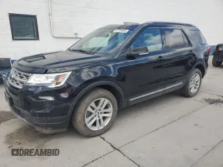 2018 Ford Explorer XLT with VIN 1FM5K8D84JGB94843, listed as a Copart auction lot 55755645 with 104,709 mi miles and Salvage title. Bid and sale history available at DreamBid. Image 1.