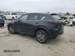 2024 Mazda CX-5 2.5 Turbo Signature with VIN JM3KFBXY6R0401491, listed as a Copart auction lot 52446225 with 13,951 mi miles and Salvage Title. Bid and sale history available at carsss.com. Image 2.