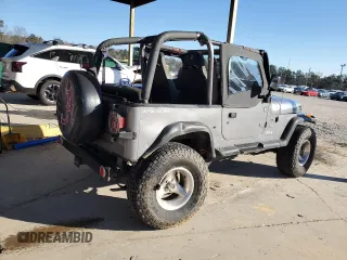 1994 Jeep Wrangler with VIN 1J4FY29S4RP471828, listed as a Copart auction lot 87893385 with 210,743 mi miles and Salvage Title. Bid and sale history available at carsss.com. Image 3.
