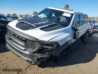 2021 Ram 1500 TRX with VIN 1C6SRFU97MN906138, listed as a IAAI auction lot 41291018 with 62,850 mi miles. Bid and sale history available at carsss.com. Image 2.