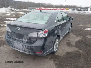 2010 Lexus HS 250h with VIN JTHBB1BA7A2005666, listed as a IAAI auction lot 41556807 with 227,184 mi miles and . Bid and sale history available at DreamBid. Image 4.
