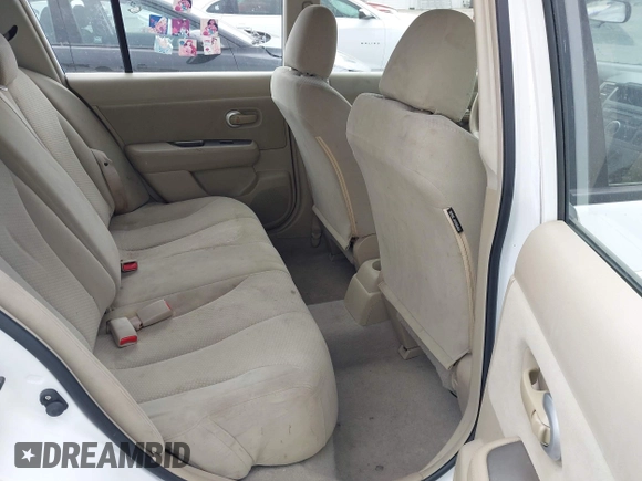 2010 Nissan Versa S with VIN 3N1BC1CPXAL377411, listed as a IAAI auction lot 42598871 with 135,059 mi miles and . Bid and sale history available at DreamBid. Image 8.