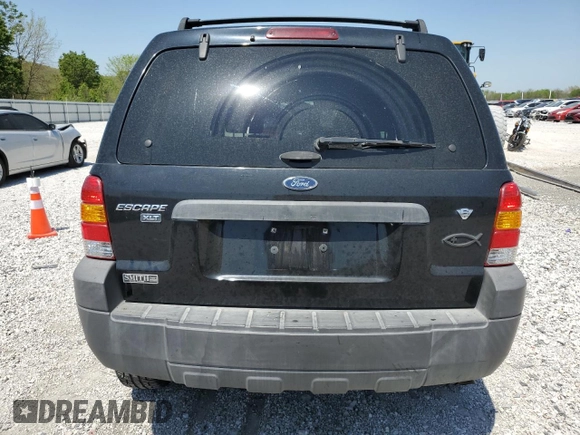 2007 Ford Escape XLT с VIN 1FMYU93137KB87700, выставлен на аукционе Copart как лот 53359075 с пробегом 128 425 миль миль и Списание • Salvage title. История ставок и продаж доступна на DreamBid. Изображение 6.