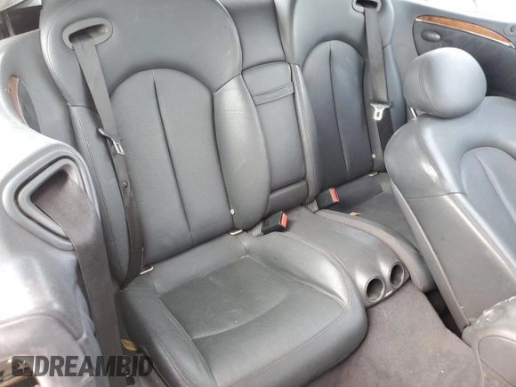 2004 Mercedes-Benz CLK 500 z VIN WDBTK75G04T005692, wystawiony jako Copart lot #77038514 z przebiegiem 125 997 mil mil oraz Szkoda całkowita • Salvage title. Historia ofert i sprzedaży dostępna na DreamBid. Obrazek 10.