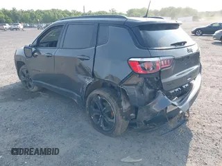 2018 Jeep Compass Latitude with VIN 3C4NJDBB0JT395844, listed as a IAAI auction lot 42405343 with 140,220 mi miles and . Bid and sale history available at DreamBid. Image 3.
