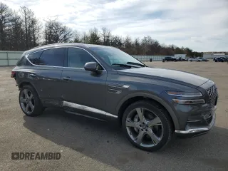 2023 Genesis GV80 with VIN KMUHCESC3PU124360, listed as a Copart auction lot 52595195 with 28,537 mi miles and Salvage title. Bid and sale history available at DreamBid. Image 4.