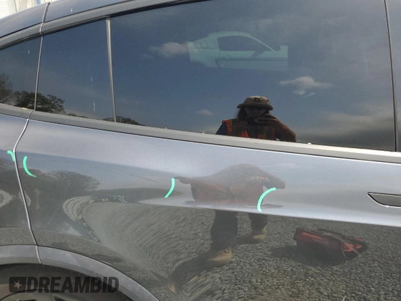 2016 Tesla Model X 70D z VIN 5YJXCBE23GF005295, wystawiony jako Copart lot #51034005 z przebiegiem 130 325 mil mil oraz Szkody całkowita. Historia ofert i sprzedaży dostępna na DreamBid. Obrazek 11.
