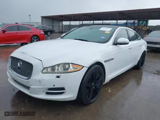 2012 Jaguar XJ with VIN SAJWA1CB7CLV35339, listed as a IAAI auction lot 41945850 with 123,501 mi miles. Bid and sale history available at carsss.com. Image 2.