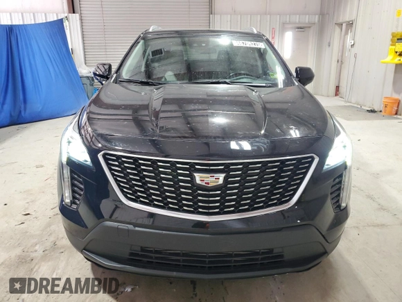 2021 Cadillac XT4 AWD Luxury with VIN 1GYFZBR42MF055788, listed as a Copart auction lot 46704275 with 23,516 mi miles and Clean Title. Bid and sale history available at carsss.com. Image 5.