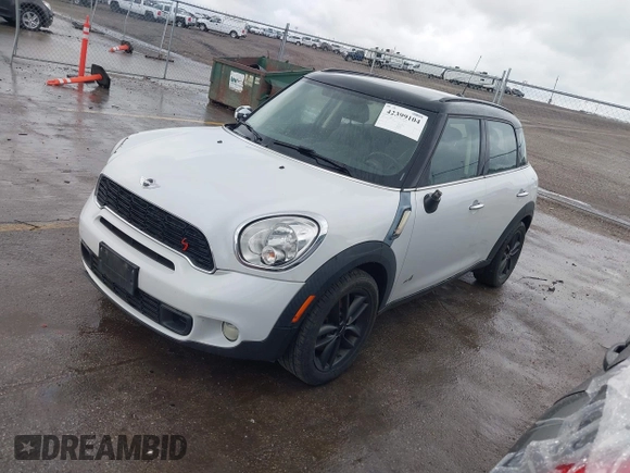 2013 MINI Countryman S ALL4 with VIN WMWZC5C50DWP30199, listed as a IAAI auction lot 42399104 with 103,367 mi miles and . Bid and sale history available at DreamBid. Image 2.