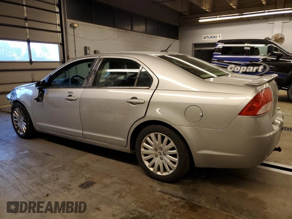 2010 Mercury Milan Hybrid with VIN 3MEDM0L33AR601687, listed as a Copart auction lot 84450914 with 218,398 mi miles and Salvage Title. Bid and sale history available at carsss.com. Image 2.